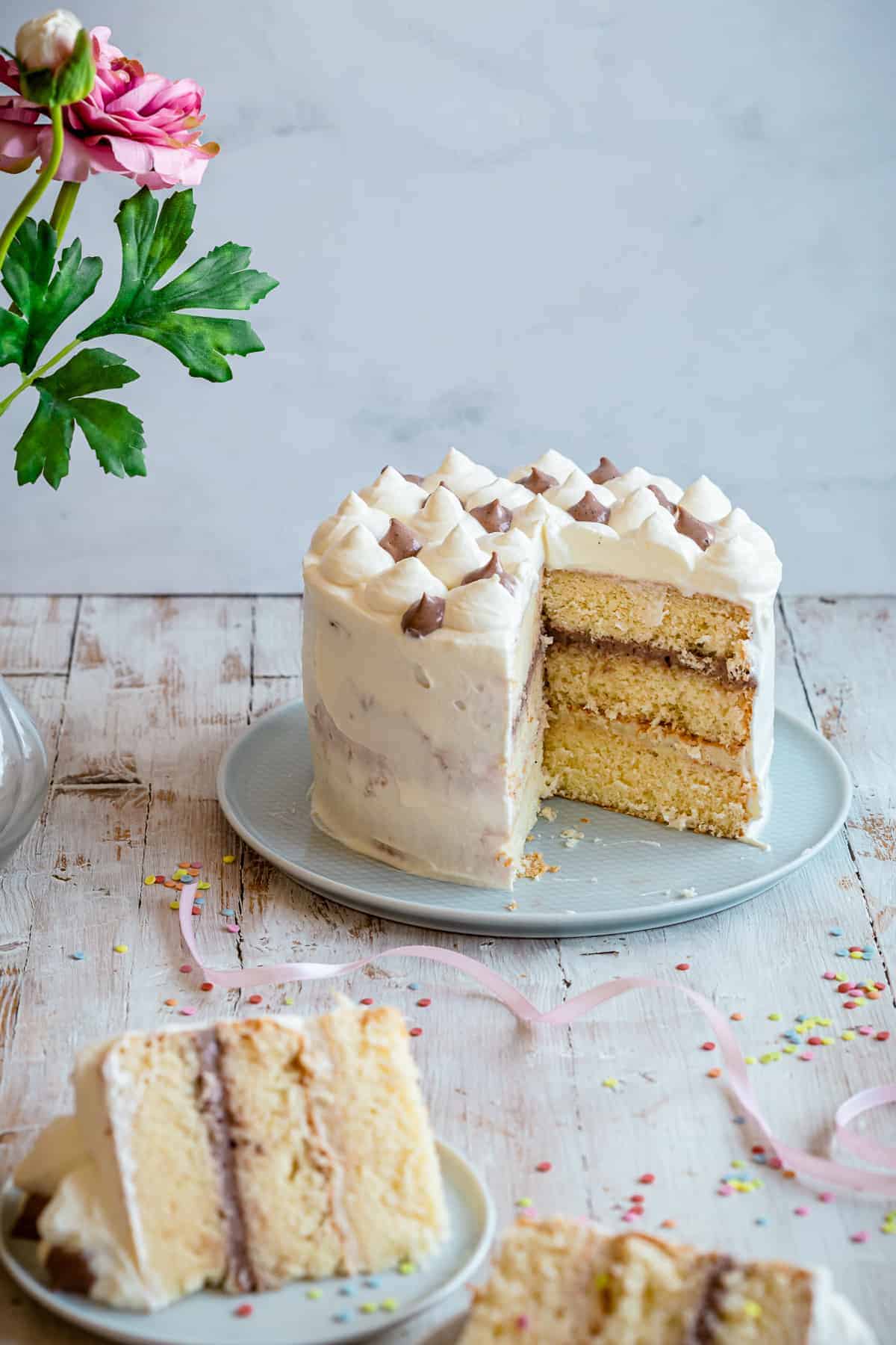 a sliced cake with decoration