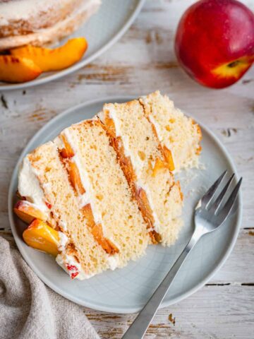 a slice of peach mascarpone cake